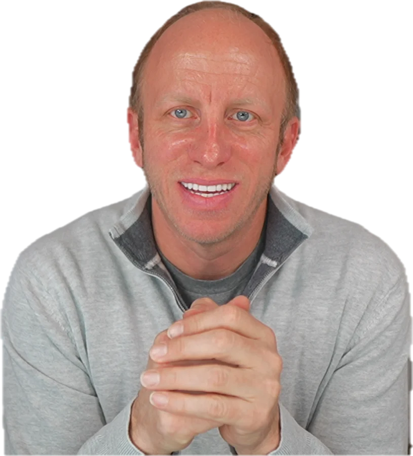 Dan Vega, who made Clearing, smiling with his hands folded.